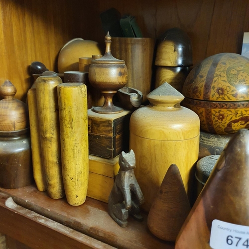 674 - Assorted lignum vitae treen, and other treen (top shelf of the lounge unit)