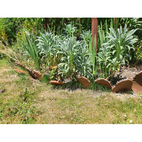 92 - Approx. sixty earthenware garden edging tiles, of leaf form, each approx. 32 cm high x 15 cm wide