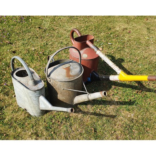 83 - A galvanised metal two gallon watering can, and two others similar (3)