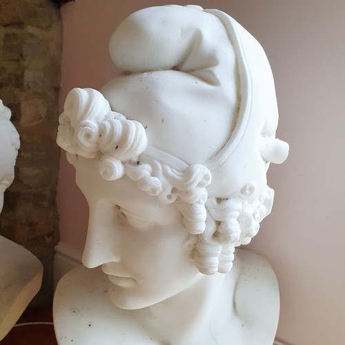 476 - A late 19th/early 20th century carved marble bust, on a socle base, approx. 60 cm high