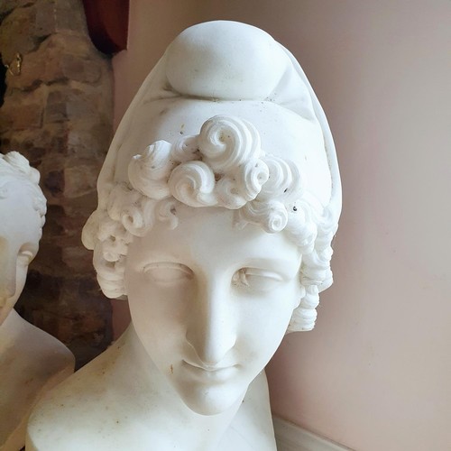 476 - A late 19th/early 20th century carved marble bust, on a socle base, approx. 60 cm high