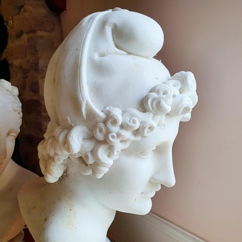 476 - A late 19th/early 20th century carved marble bust, on a socle base, approx. 60 cm high