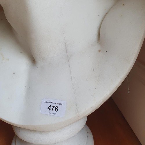 476 - A late 19th/early 20th century carved marble bust, on a socle base, approx. 60 cm high