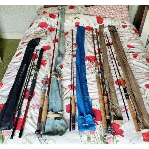 607 - A group of assorted fishing rods