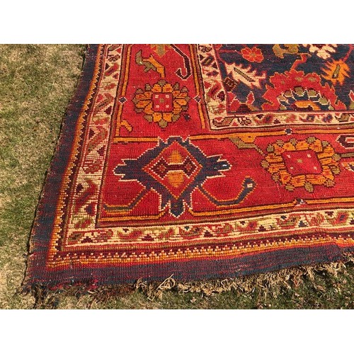 537 - A Ushak carpet, approx. 375 x 252 cm, attic stored, very worn and faded, some loss, see images