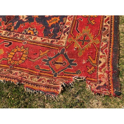 537 - A Ushak carpet, approx. 375 x 252 cm, attic stored, very worn and faded, some loss, see images