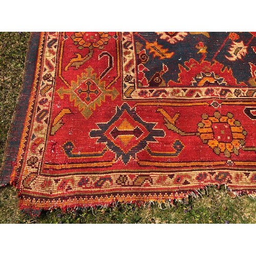 537 - A Ushak carpet, approx. 375 x 252 cm, attic stored, very worn and faded, some loss, see images