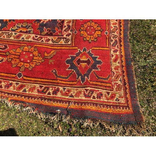 537 - A Ushak carpet, approx. 375 x 252 cm, attic stored, very worn and faded, some loss, see images