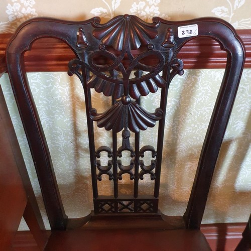 272 - A George III style mahogany carver chair, the back carved and pierced ribbon ties and swags, with a ... 