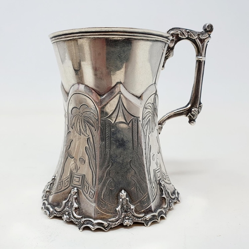 179 - A Victorian silver christening mug, the octagonal spreading based with chinoiserie engraved decorati... 