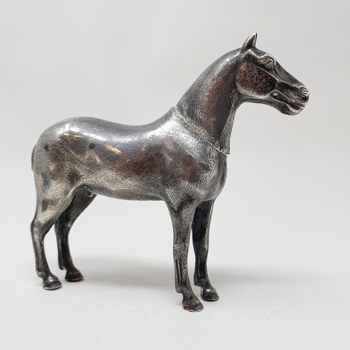 181 - A Victorian silver figure, of a horse, with a detachable head, Edward H Stockwell, London 1893, 10 c... 