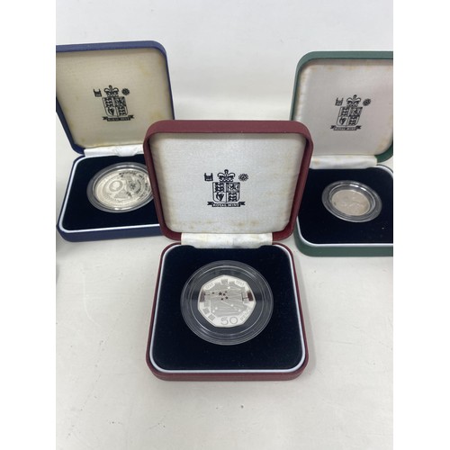 82 - A Royal Mint silver proof £2 coin, Falkland Islands 1991, cased, and others (10)