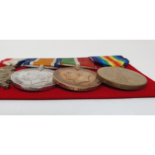 32 - A group of four medals, awarded to Lieut L Morton RNR, comprising a 1914-15 Trio and a Mercantile Ma... 