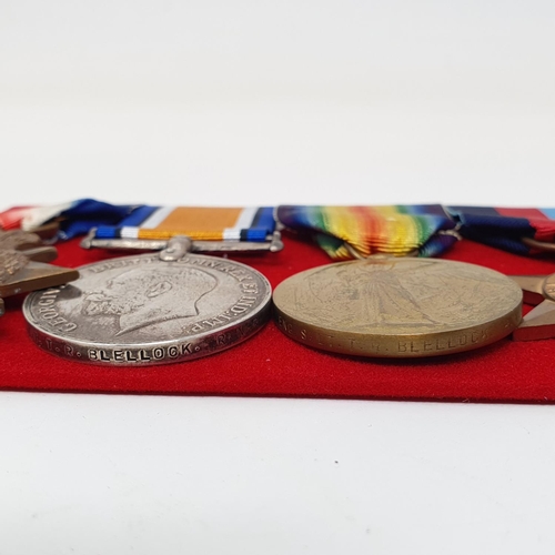 33 - A group of six medals, awarded to Eng S Lt T R Blellock RNR, comprising a 1914-15 Trio, a 1939-1945 ... 