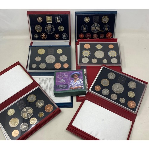 102 - A Royal Mint year proof set, 1999, boxed, five others, and a commemorative silver proof £5 coin, cas... 