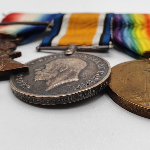 44 - A group of four medals, awarded to 68097 S STH A Pulman RFA, comprising a 1914 Trio and a Long Servi... 