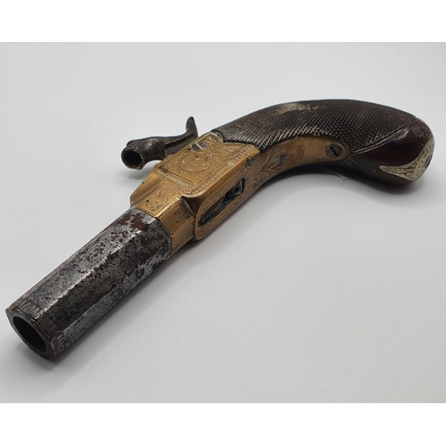 48 - A muff pistol, 15 cm wide, barrel engraved Smith of London, brass and steel with wood grip, proof ma... 