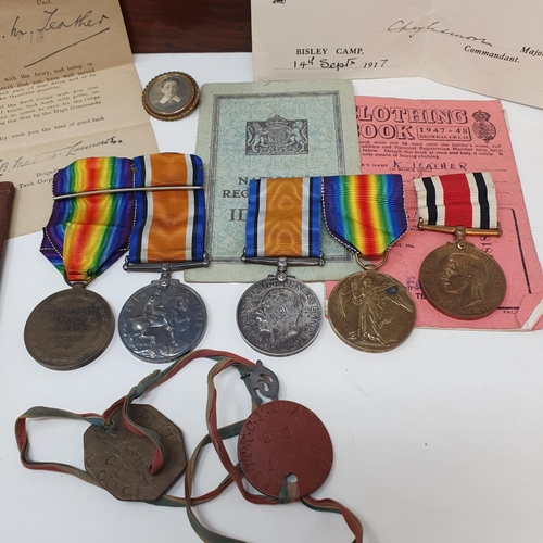 54 - A family group of medals, comprising a British War Medal and Victory Medal pair, awarded to Lieut Re... 