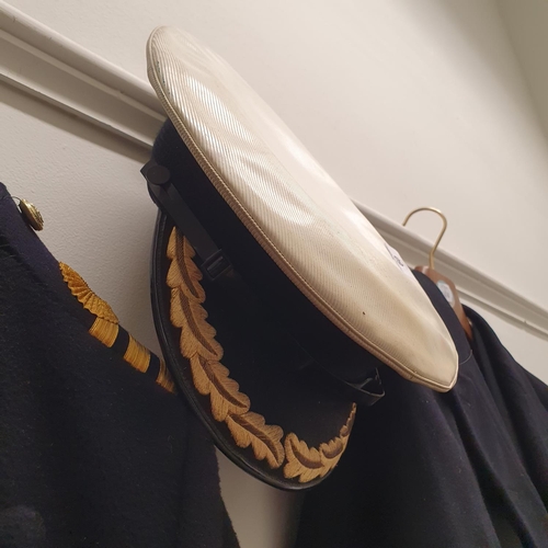 60 - A Royal Naval officers jacket, assorted uniforms