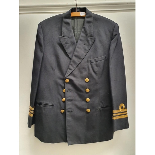 61 - A Royal Naval officers jacket and assorted naval uniforms (qty)