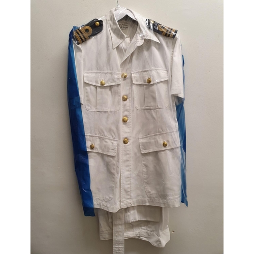 61 - A Royal Naval officers jacket and assorted naval uniforms (qty)