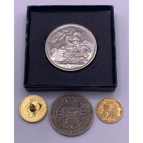 194 - A Victorian half sovereign, shield back, 1892, a George V half crown, a Festival Of Britain Medal, a... 