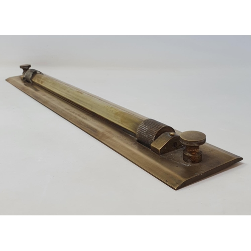 16 - A brass rolling ruler, 47 cm wide