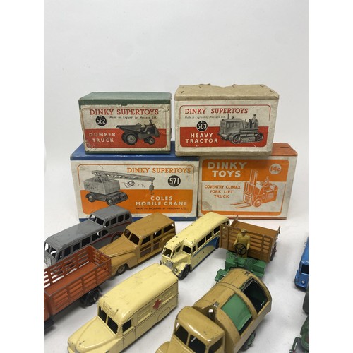 515 - A Dinky Supertoys Heavy Tractor, No. 563, boxed, a Coventry Climax Fork Lift Truck, boxed, a Coles M... 