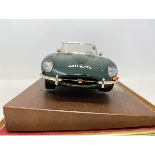 535 - A Burgo model of a Jaguar E Cabriolet (1961), in a mahogany and perspex case, 30 cm wide