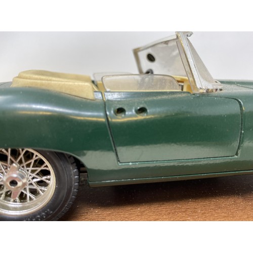 535 - A Burgo model of a Jaguar E Cabriolet (1961), in a mahogany and perspex case, 30 cm wide