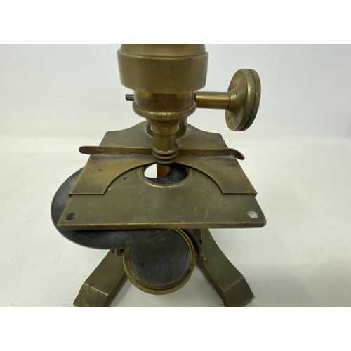 586 - A student's brass microscope, 33 cm high