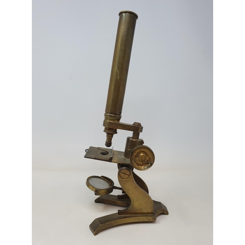 586 - A student's brass microscope, 33 cm high