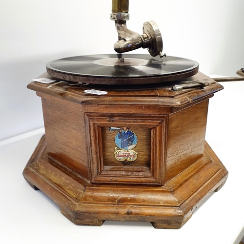 592 - An Amplifier gramophone, with a brass horn, 46 cm diameter