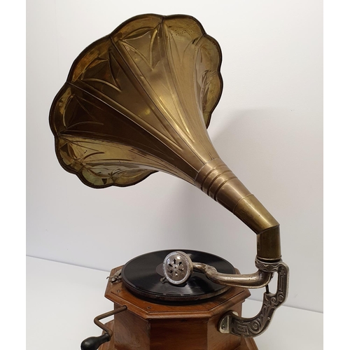 592 - An Amplifier gramophone, with a brass horn, 46 cm diameter