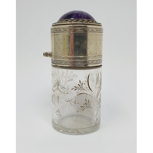 639 - A French silver coloured metal and glass scent bottle, with an amethyst cabochon top, 9.5 cm high