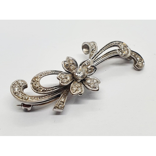 640 - A white gold and diamond floral spray brooch, 4.5 cm