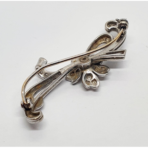 640 - A white gold and diamond floral spray brooch, 4.5 cm