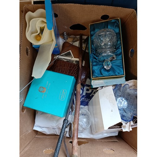 659 - A Tudor crystal decanter set, boxed, assorted books, a footstool, and various miscellanea (10 boxes)