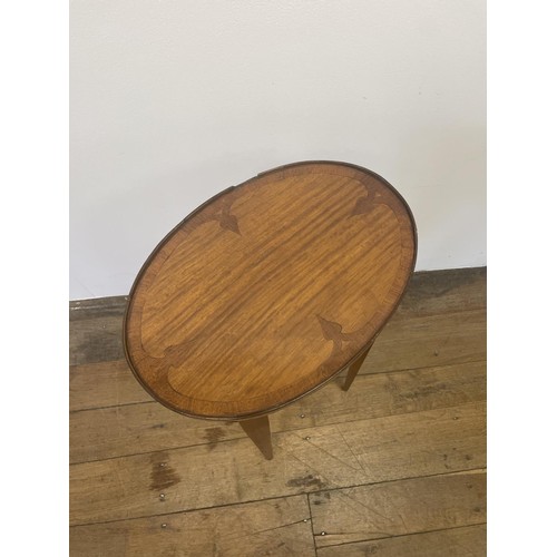 727 - A mahogany kettle stand, 73 cm high