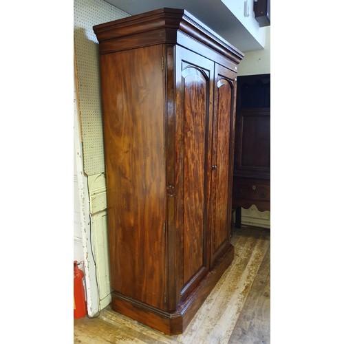 733 - A 19th century mahogany double wardrobe, 214 cm high x 148 cm wide