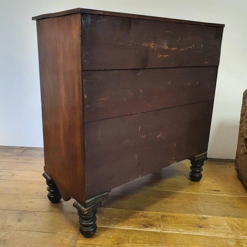 738 - A Channel Islands mahogany chest, having two short and three long drawers, flanked by spiral turned ... 