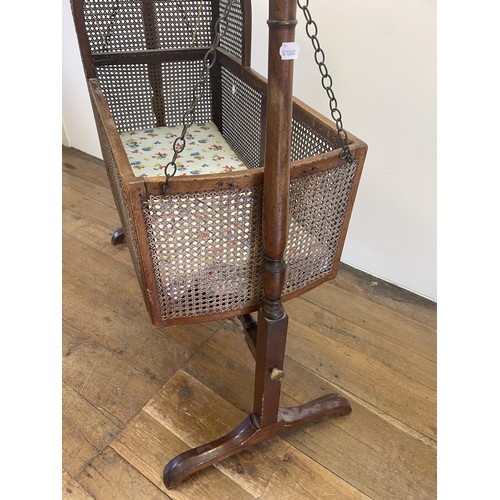 739 - A 19th century mahogany bergere cot, 100 cm wide