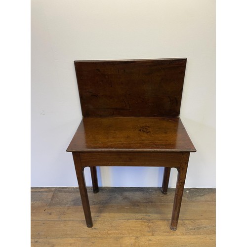 777 - A 19th century mahogany folding tea table, on square chamfered legs, 73 cm high, 68 cm wide