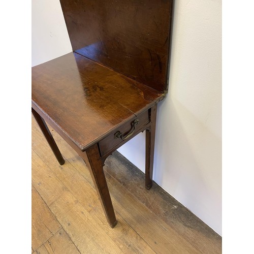 777 - A 19th century mahogany folding tea table, on square chamfered legs, 73 cm high, 68 cm wide