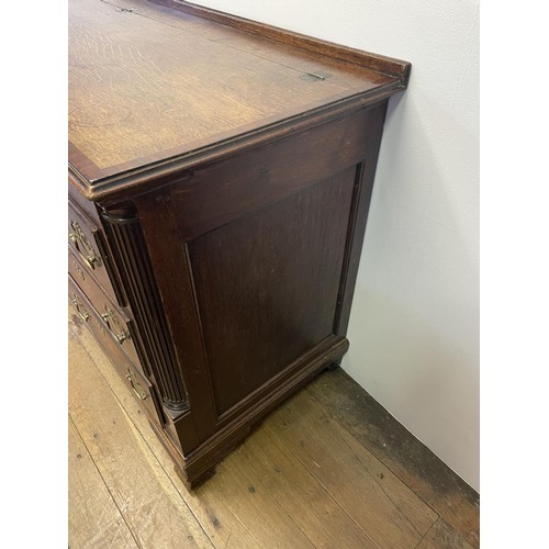 781 - An oak mule chest, with a hinged top, above six faux drawers and three real drawers, 169 cm wide