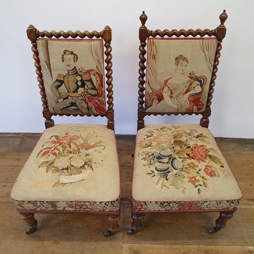 784 - A pair of 19th century rosewood framed nursing chairs, with embroidered backs and seats (2)