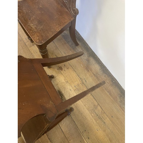 793 - A pair of 19th century mahogany hall chairs (2)