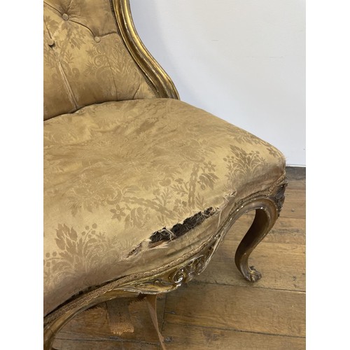 796 - A 19th century gilt framed button back nursing chair