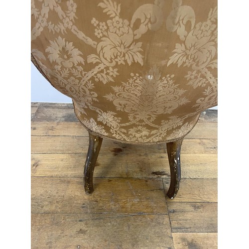 796 - A 19th century gilt framed button back nursing chair