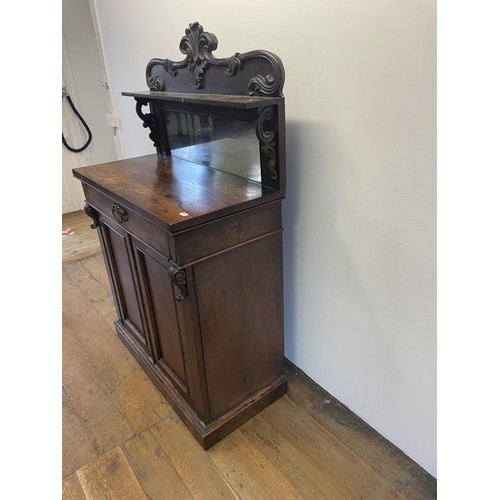 802 - A 19th century rosewood chiffonier, with a raised mirrored back, the base having a drawer and two cu... 